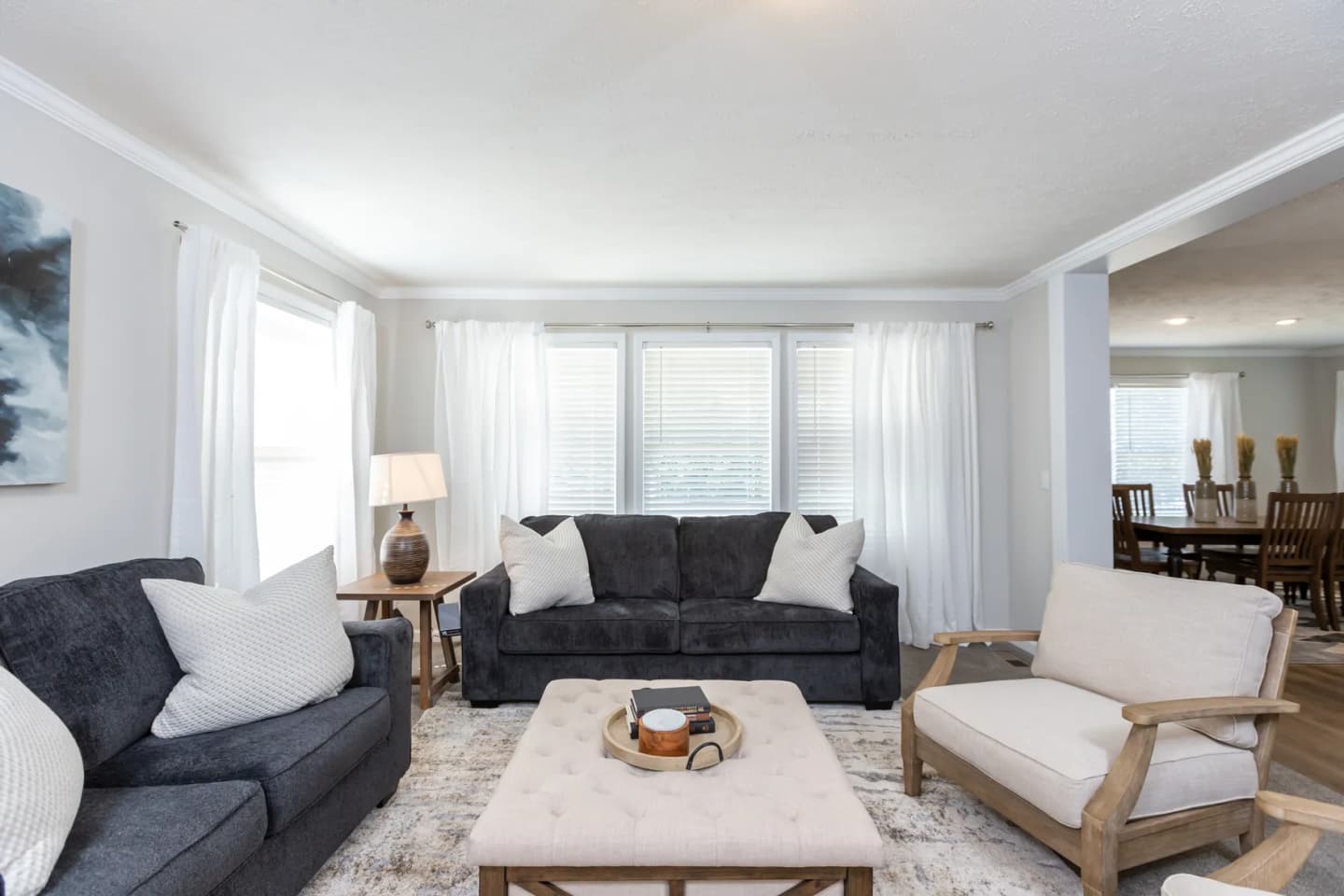 Illustrative Keeneland model-family living room; regional layout varies